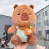 Cappy Nâu mặc yếm xanh lá ôm cam 25cm m28