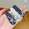1 Tách kẹp mái đen trắng chấm bi nơ tim