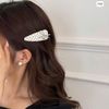 1 Tách kẹp mái đen trắng chấm bi nơ tim
