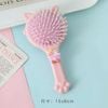 Lược gỡ rối tai mèo đính charm