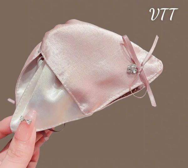 Cào tam giác lụa bóng xanh hồng nơ đá