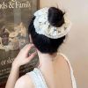 Scrunchies caro nhiều nơ đen trắng