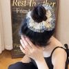 Scrunchies caro nhiều nơ đen trắng