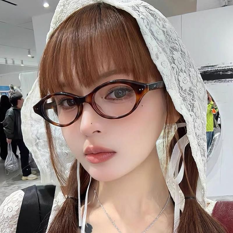 Gọng kính nữ form oval phong cách Y2K xu hướng - Kính Mắt July 8631 Titan