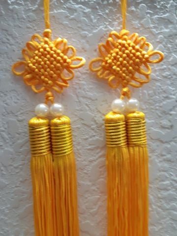 Nút thắt vô tận màu vàng Vip tua dài 54cm giá 1 cặp 2 cái 110K