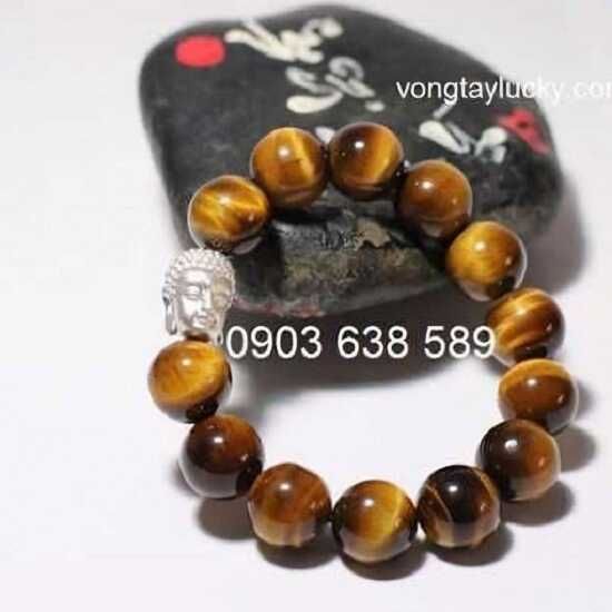 Vòng tay đá mắt hổ đẹp 14li phối đầu phật Thích ca bạc Thái