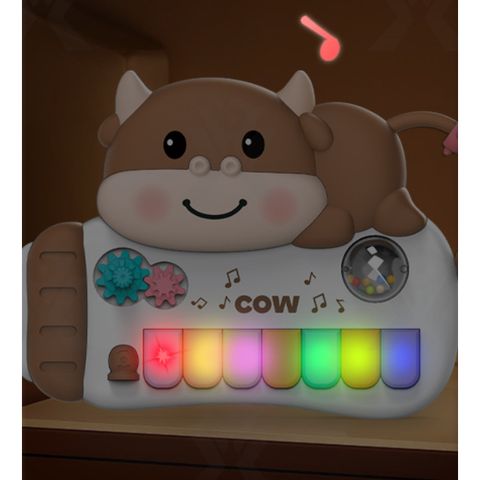 Đồ chơi đàn piano hình bò bình sữa, có nhạc phát sáng cho bé