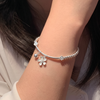 Lắc tay bạc Việt Nam bi hoa đính charm chuông thanh lịch | Cáo Bạc