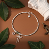 Lắc tay bạc Việt Nam Ribbon Wishes nơ bạc tim hồng đá tròn | Cáo Bạc