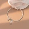 Lắc tay bạc Việt Nam Ribbon Wishes nơ bạc tim hồng đá tròn | Cáo Bạc