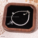  Lắc tay bạc Việt Nam Ngọc trai Freshwater Grace Ribbon charm nơ đính đá | Cáo Bạc 