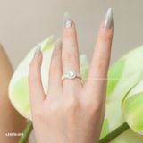  Nhẫn bạc ta ổ đá bốn chấu viền đá tròn xoáy cạnh hai hàng đá 