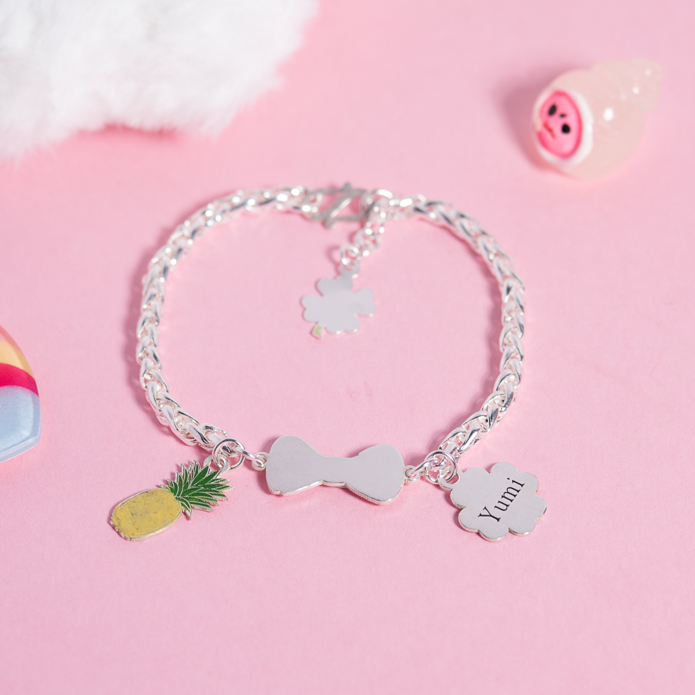  Lắc tay bạc Việt Nam trẻ em tag nơ vảy rồng mix charm Dứa + 4 Lá may mắn khắc tên | Cáo Bạc 