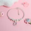 Kiềng bạc cho bé xoắn mix charm hoa bi Kitty đeo nơ treo khắc tên | Cáo Bạc