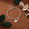 Lắc tay bạc Việt Nam Độc Lập charm hoa sen thanh lịch | Cáo Bạc