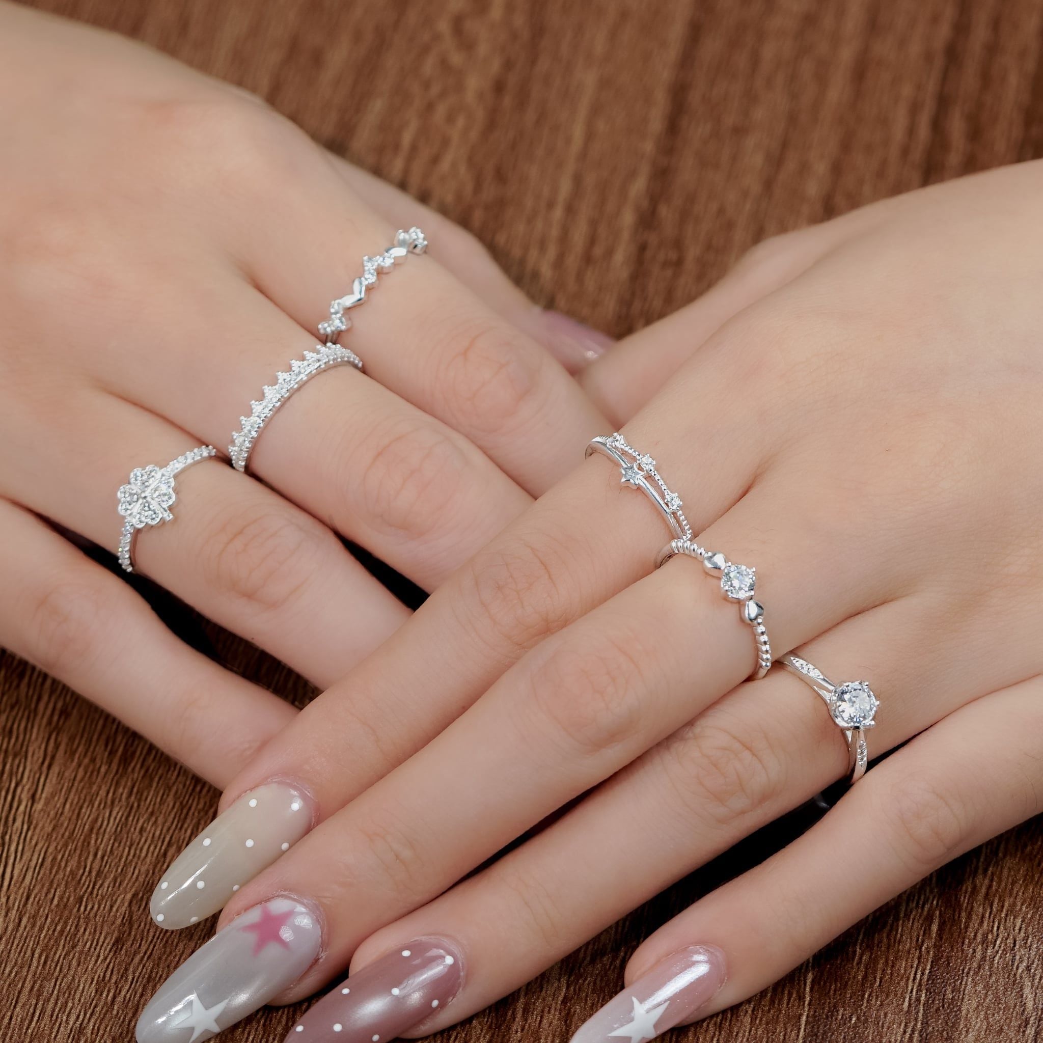  Nhẫn bạc Việt Nam 2 sợi sao trơn viền bi đính 3 đá nhỏ xen kẽ thanh lịch | Cáo Bạc 