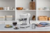  Máy pha cà phê bán tự động màu trắng hiệu Smeg Model ECF02WHEU 