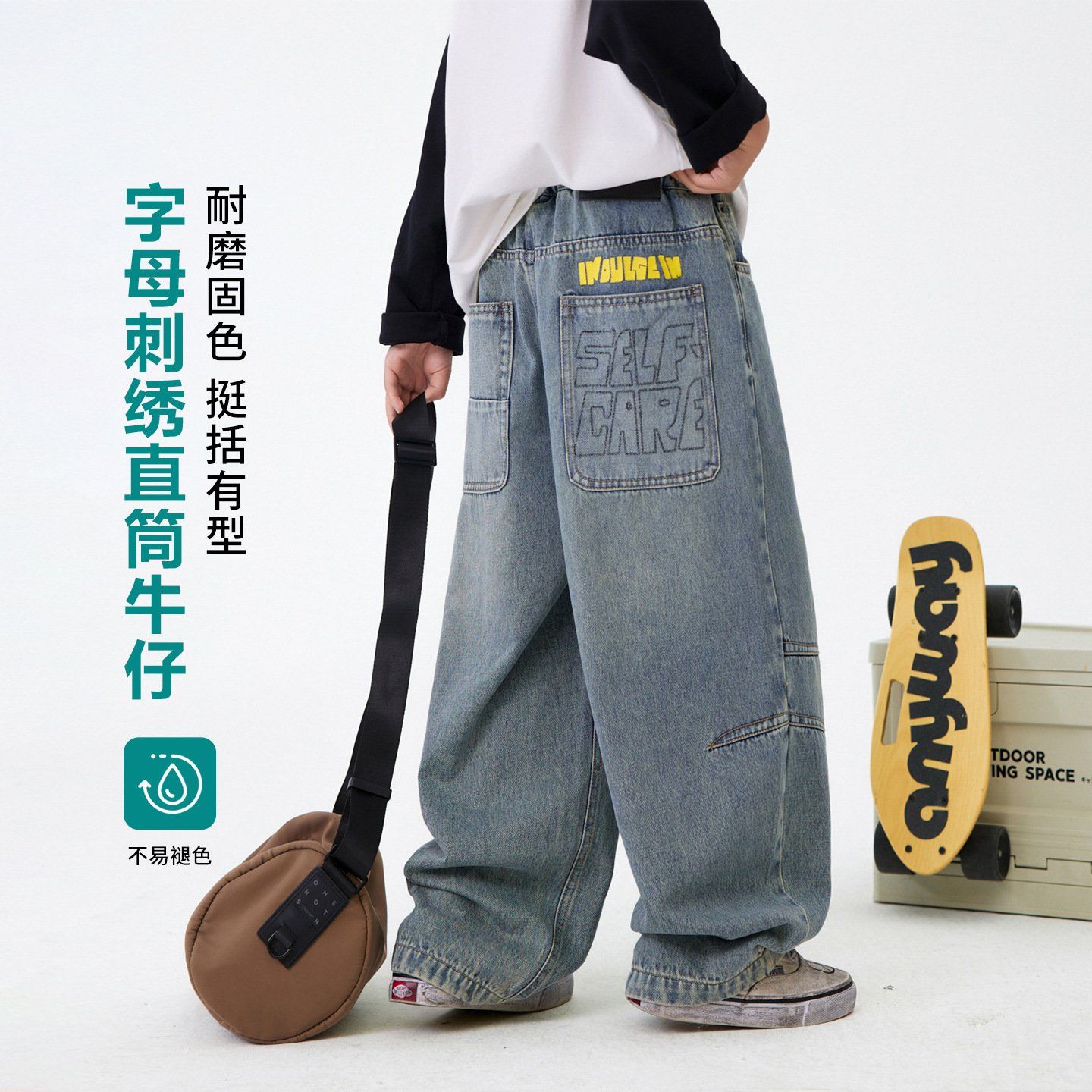 Quần jean dài túi sau họa tiết chữ QD27