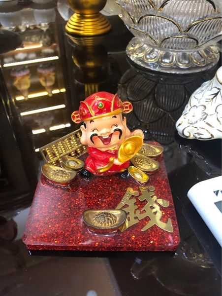  Thần Tài giá đở điện thoai 