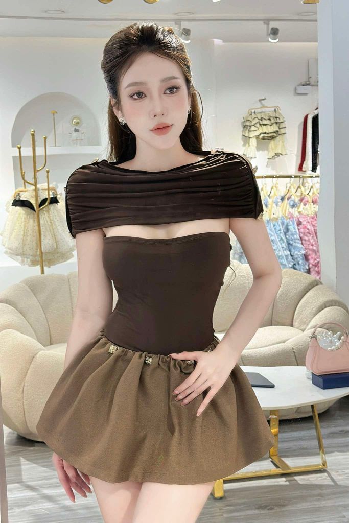 Chân váy xoè cạp thấp phối nút (H85)