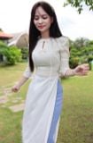  Áo dài gấm trắng 2 nơ xinh xắn 