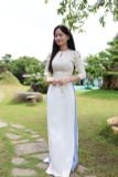  Áo dài gấm trắng 2 nơ xinh xắn 