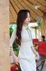  Áo Dài gấm kem vani viền rau má 