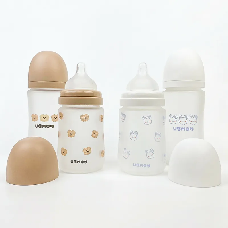  Bình Sữa Thủy Tinh Ubmom Phủ Silicone Kèm Núm - Màu Nâu 