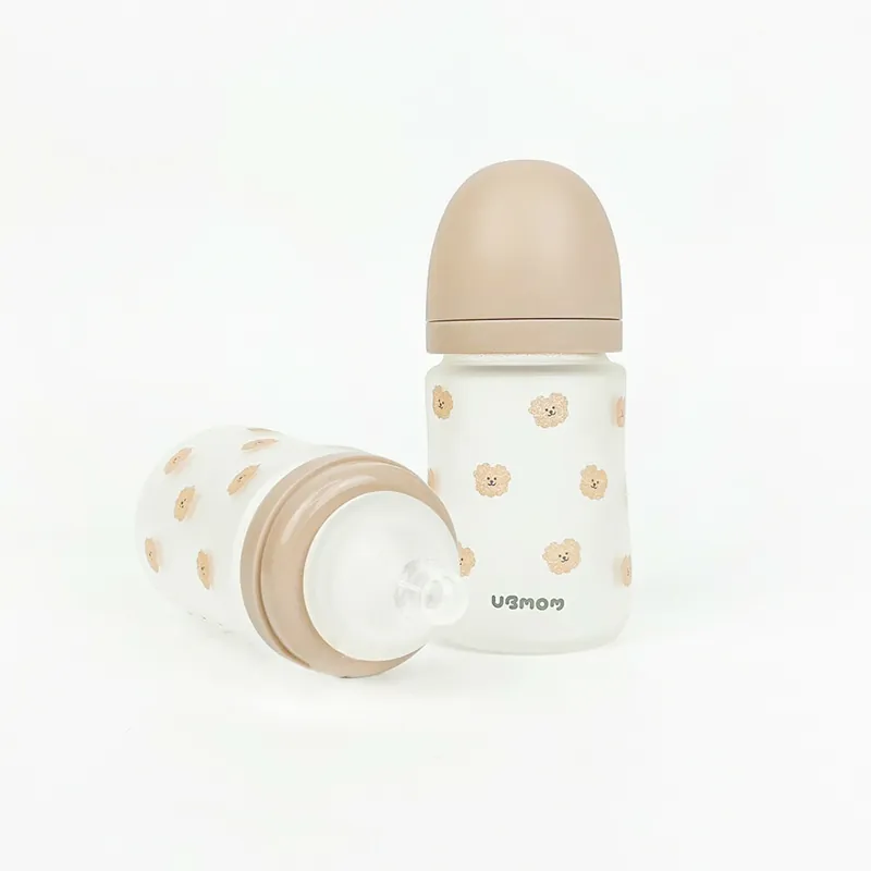  Bình Sữa Thủy Tinh Ubmom Phủ Silicone Kèm Núm - Màu Nâu 