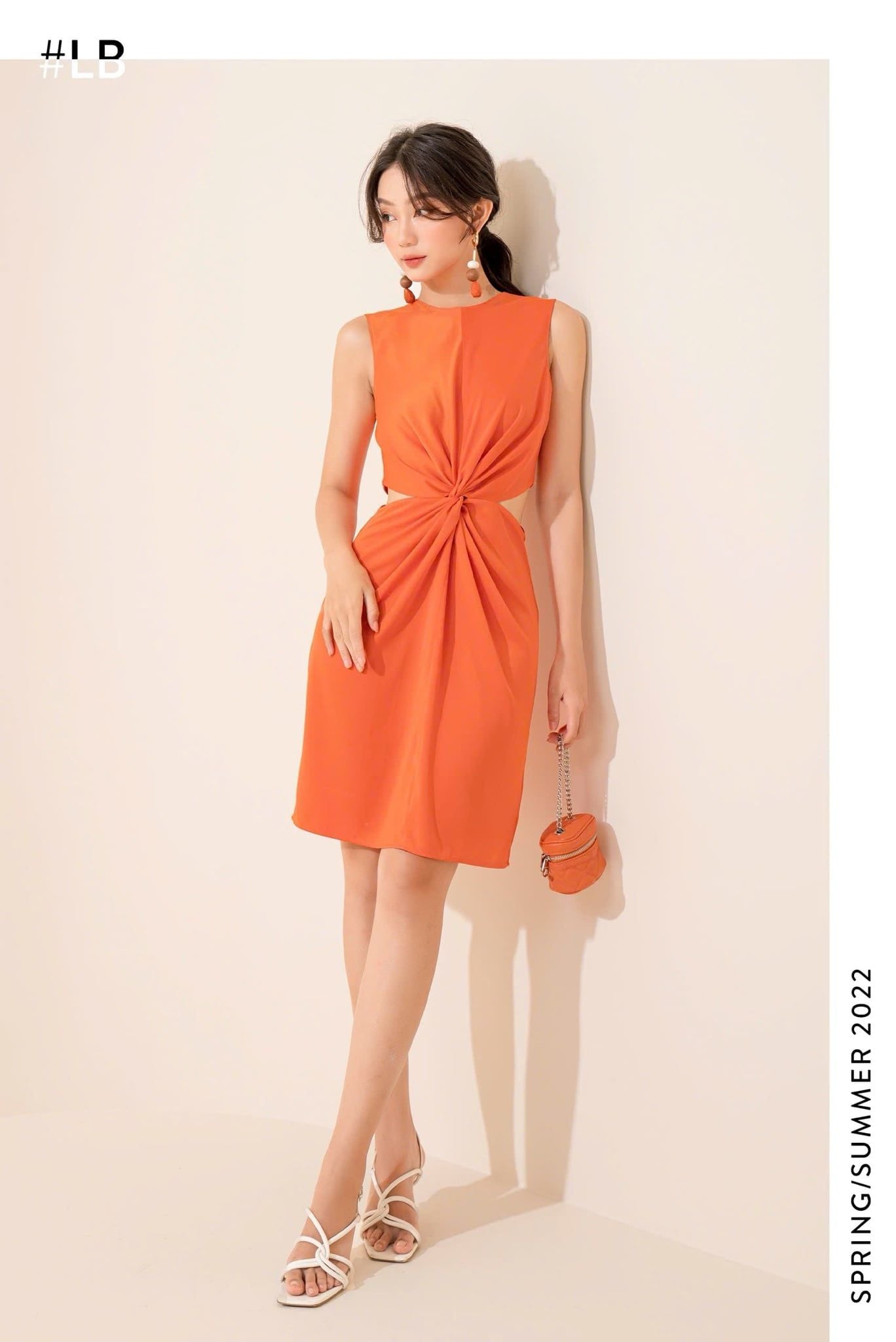  Đầm xoắn cut-out 