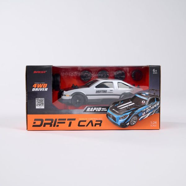 MOIJOI Xe Điều Khiển Từ Xa Drift Car Phong Cách Thể Thao Tỷ Lệ 1:24 Bánh Dự Phòng Pin Sạc 3.7V USB Tiện Lợi Thiết Kế Độc Đáo Màu Trắng Đen Kích Thước 29x15x14cm
