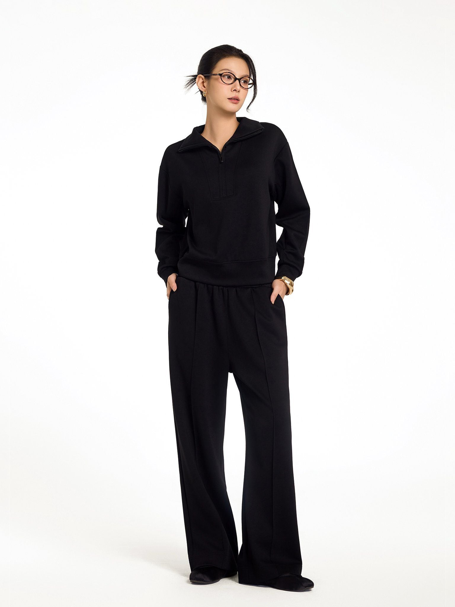  Bộ WINNY nỉ interlock quần dài tay dài màu đen 1CAPO25001D 