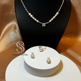  Bông tai bạc hoạ tiết ruy băng đính ngọc trai 8 ly và đá trắng nhuyễn 