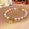  Vòng tay ngọc trai mix màu 6-6.5mm – Trang sức ngọc trai thật phối charm hoa mạ vàng Stella Pearl B58203 