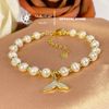 Vòng tay ngọc trai thật 6-6.5mm phối charm đuôi cá - Stella Pearl B58201