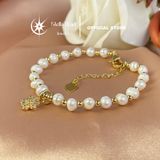  Vòng tay ngọc trai trắng 6-6.5mm charm hoa 5 cánh mạ vàng - Stella Pearl B58202 