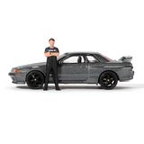  MINI GT - [KÈM FIGURE] 1/64 NISSAN SKYLINE GT-R R32 NISMO GUNMETAL WITH MATSUDA FIGURE TSUGIO MATSUDA COLLECTION - 869 
