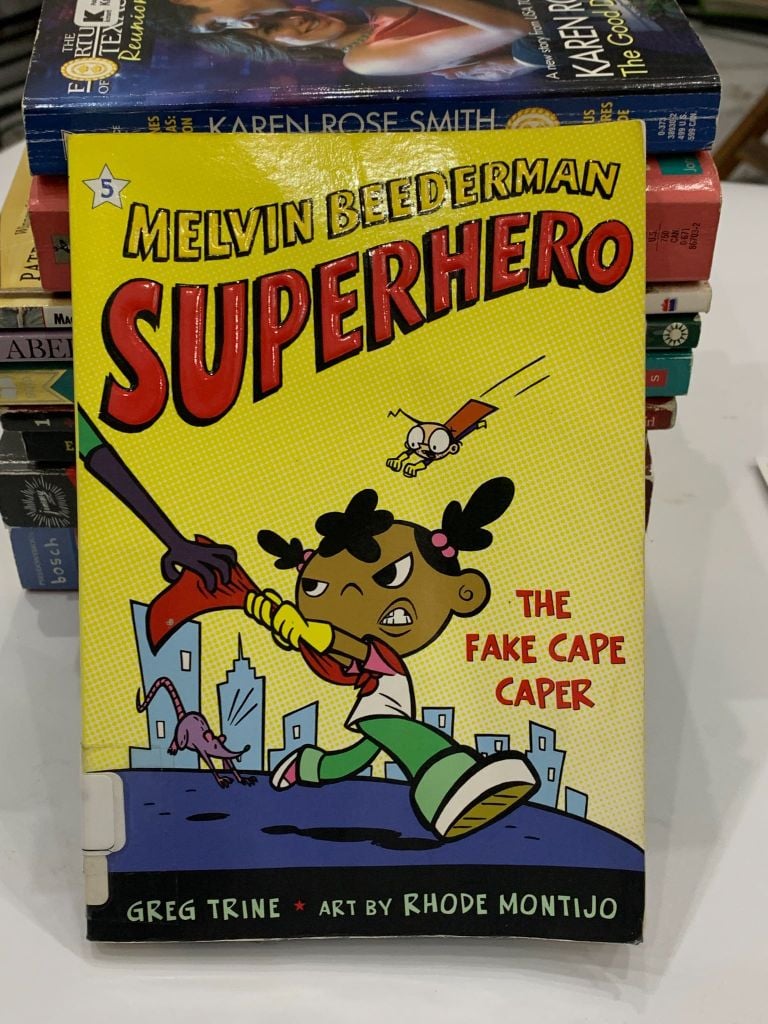 Melvin Beederman, Superhero: The Fake Cape Caper – Greg Trine - Ảnh chụp thực tế