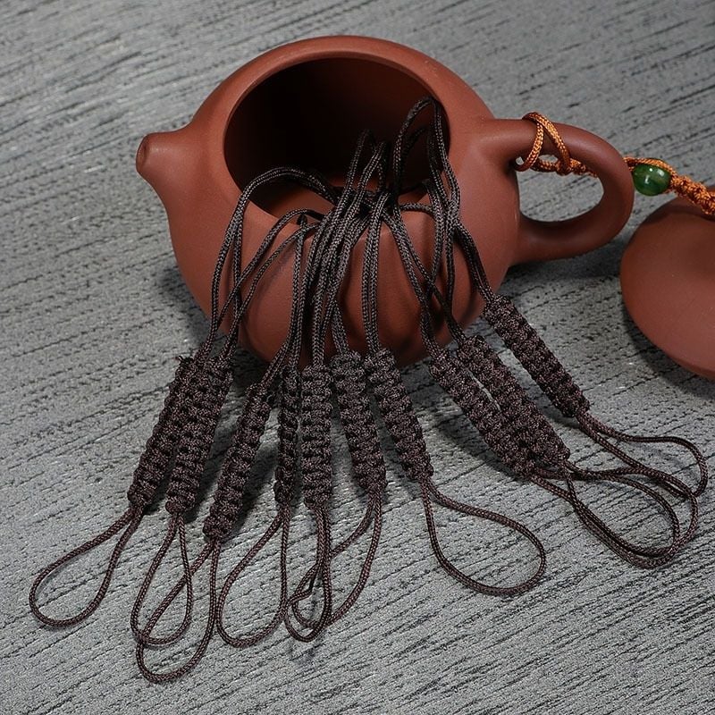  Dây buộc nắp ấm chỉ đan 