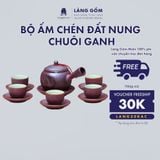  Bộ ấm chén dáng chuôi ganh khắc họa tiết hoa ban 
