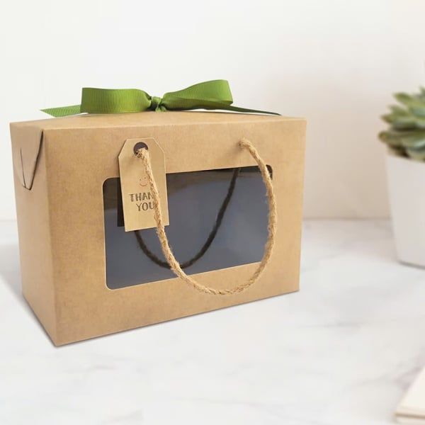 HỘP XẾP KRAFT QUAI XÁCH KÍNH - CAO 13 NGANG 19 SÂU 10 (0656-L.LAN)