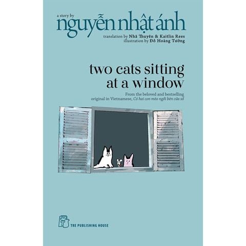 Two Cats Sitting At A Window