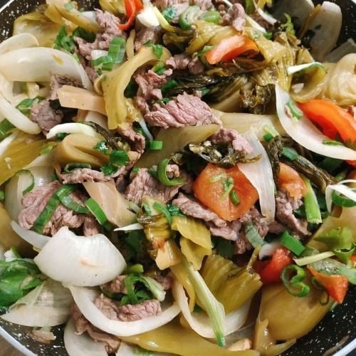  Gân bò xào cải chua 