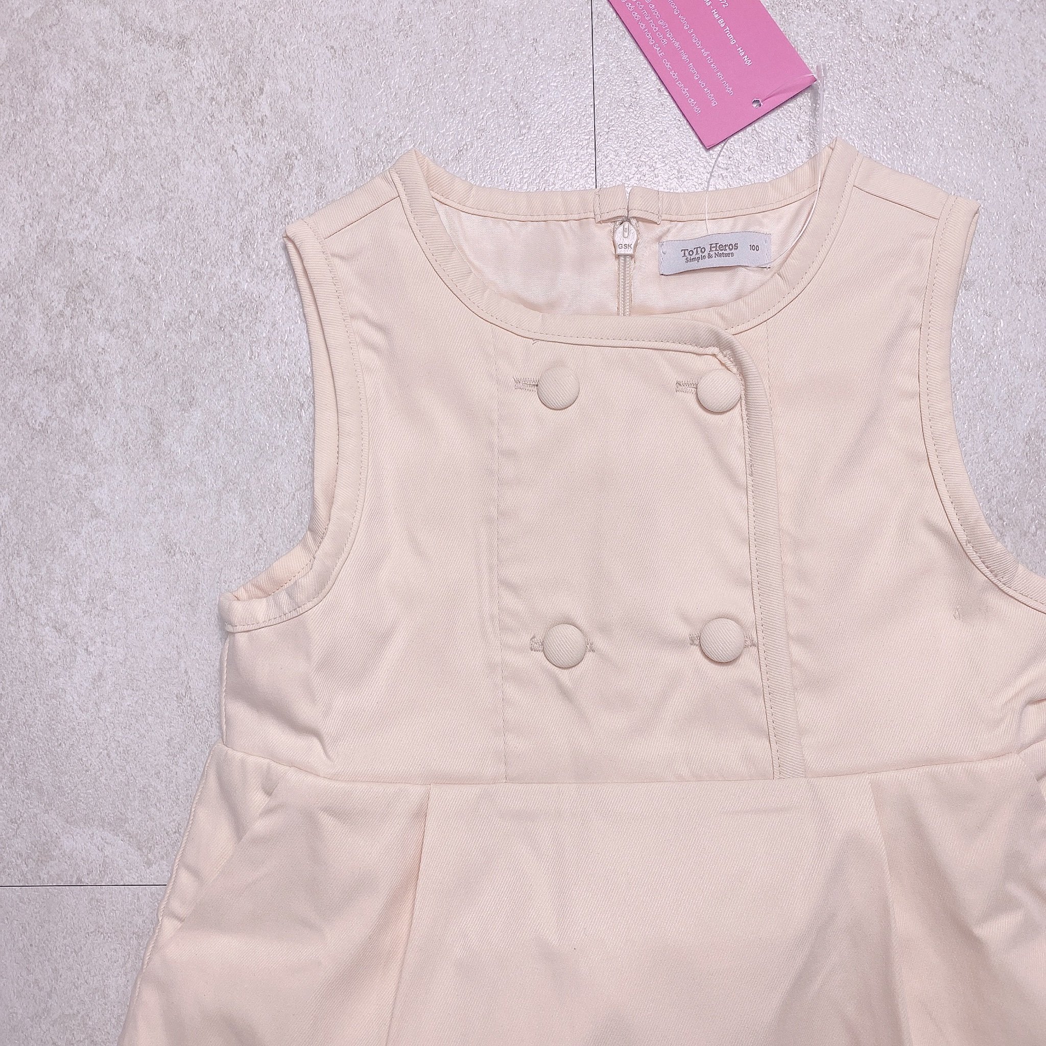 Váy sát nách Toto Heros màu be 2 hàng khuy size 100 - 150