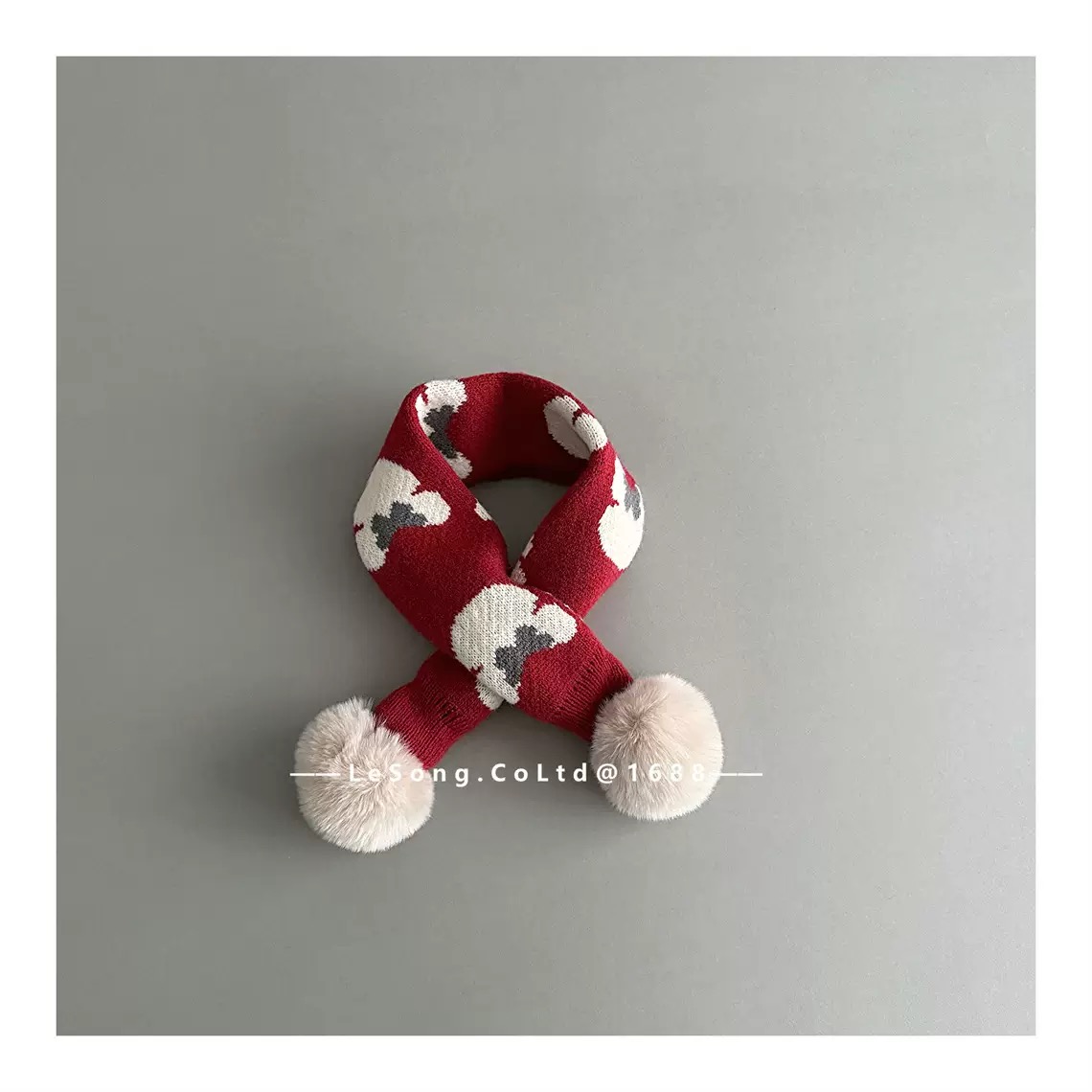 Khăn len quàng chéo đính cục bông nhiều màu noel cho bé