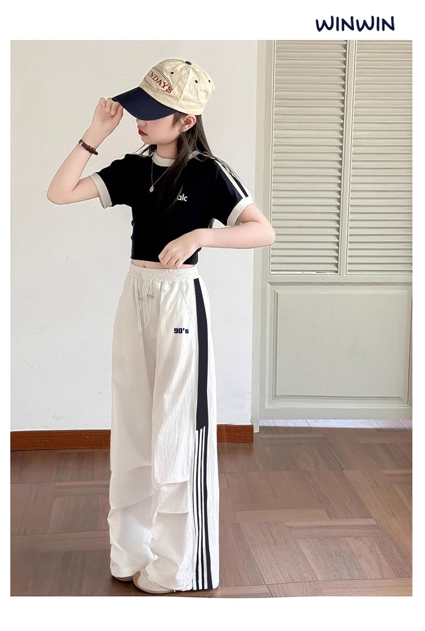 Quần gió WinWin ống suông viền sọc hông bé gái size 6-15y