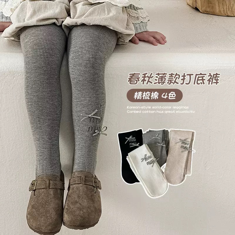 Quần tất thun tăm mùa xuân Miumiu đính nơ trơn nhiều màu cho bé size 4-12y