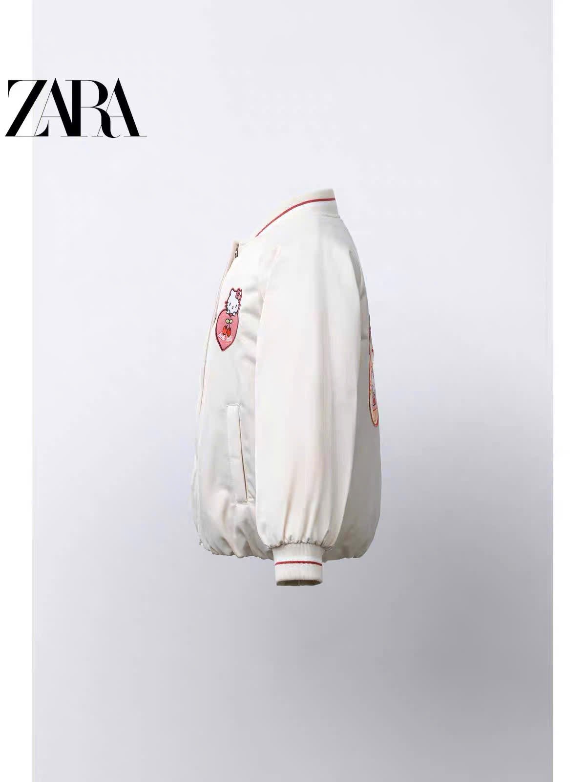 AK63 - Áo khoác bomber Hello Kitty màu be vải chống thấm size 2-6y