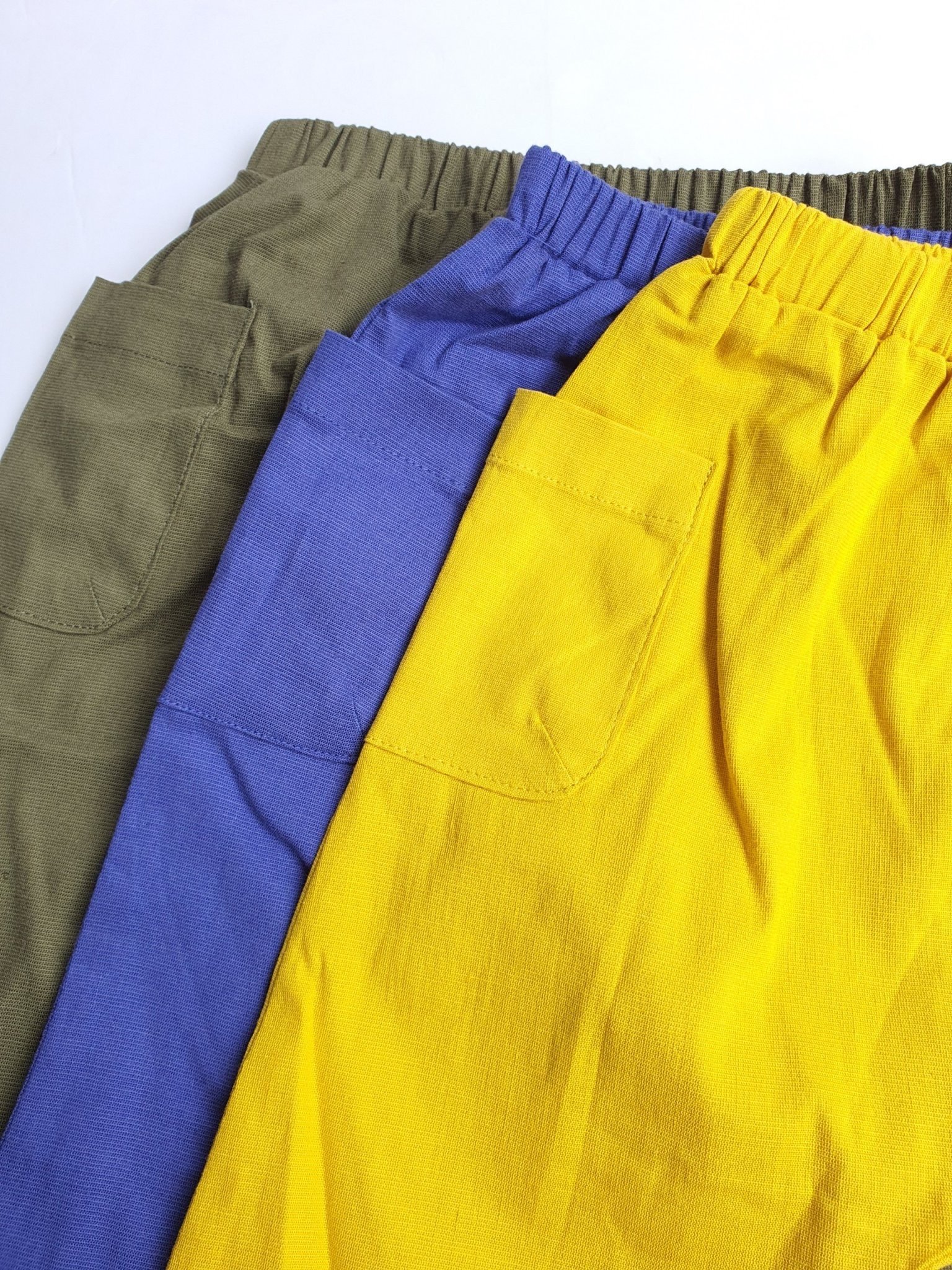 Quần liền đũng Laughing Child chất kaki chun xuất Hàn rêu/vàng/xanh