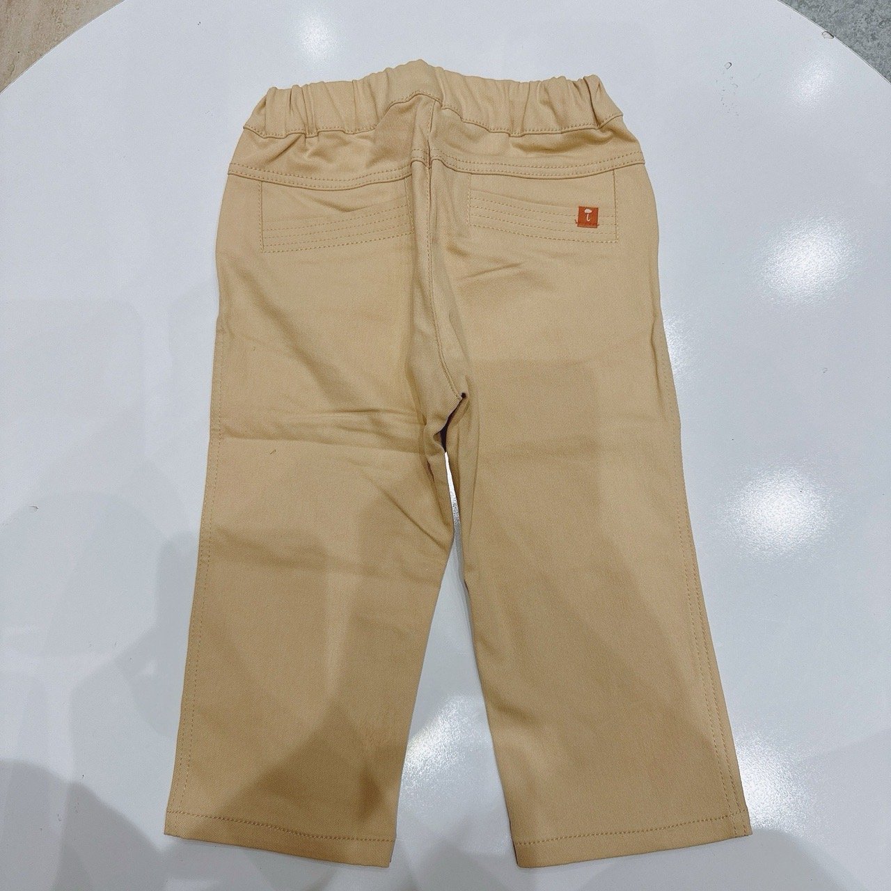 Quần kaki Moimoln màu be túi chéo viền chỉ logo mây cho bé size 90-130